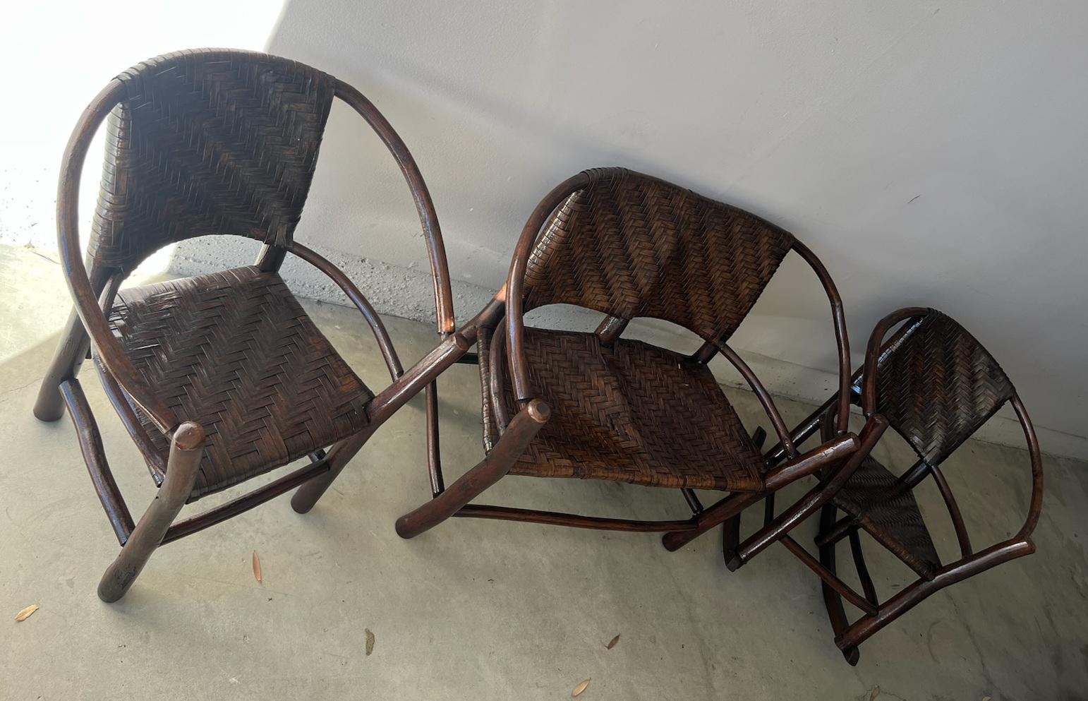 1940s set of three old hickory settee , rocker and chair set. Wonderful patina. Wonderful age. The wear and color on the set is normal and natural for its age and use. This set has been lightly varnished with a strong boat varnish for all weather