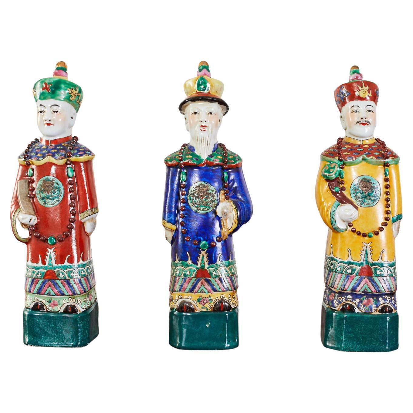 Set of Three Chinese Porcelain Qing Emperor Figures
