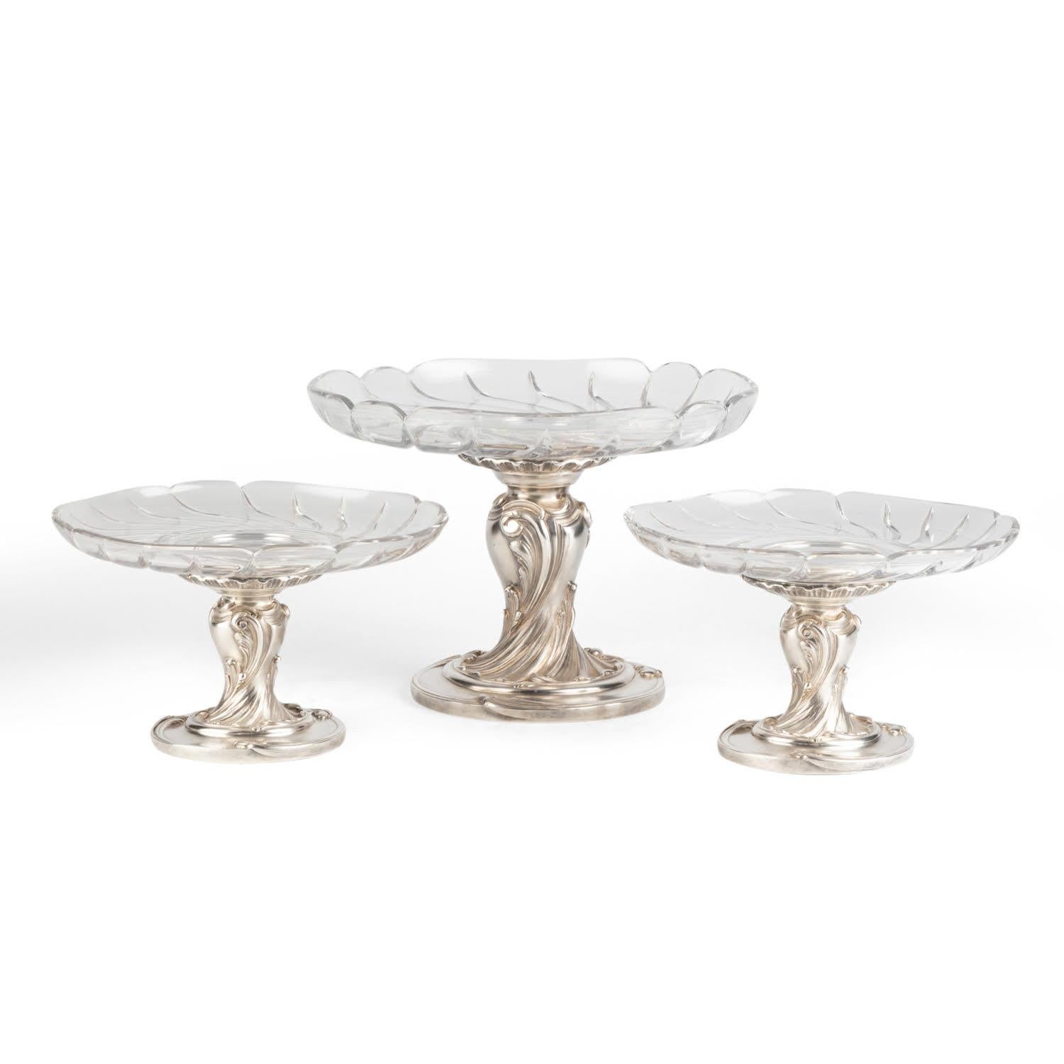 Set of three Christofle cake stands, Napoleon III period.

Three silver-plated and cut-glass cake stands by the Maison Christofle, 19th century, Napoleon III period.    
Large bowl: h: 19cm, d: 27cm
Small bowl: h: 13.5cm, d: 21.5cm
