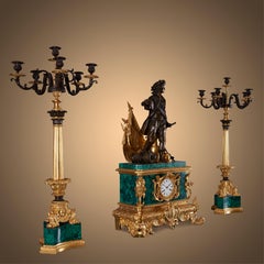 Set of three clocks and two pedestals from the 19th century.