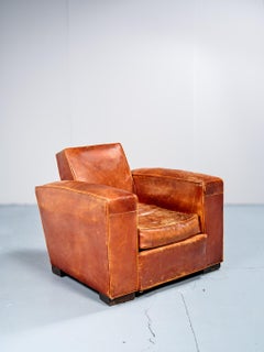 Set of three club chairs, Attribued to Jacques Adnet