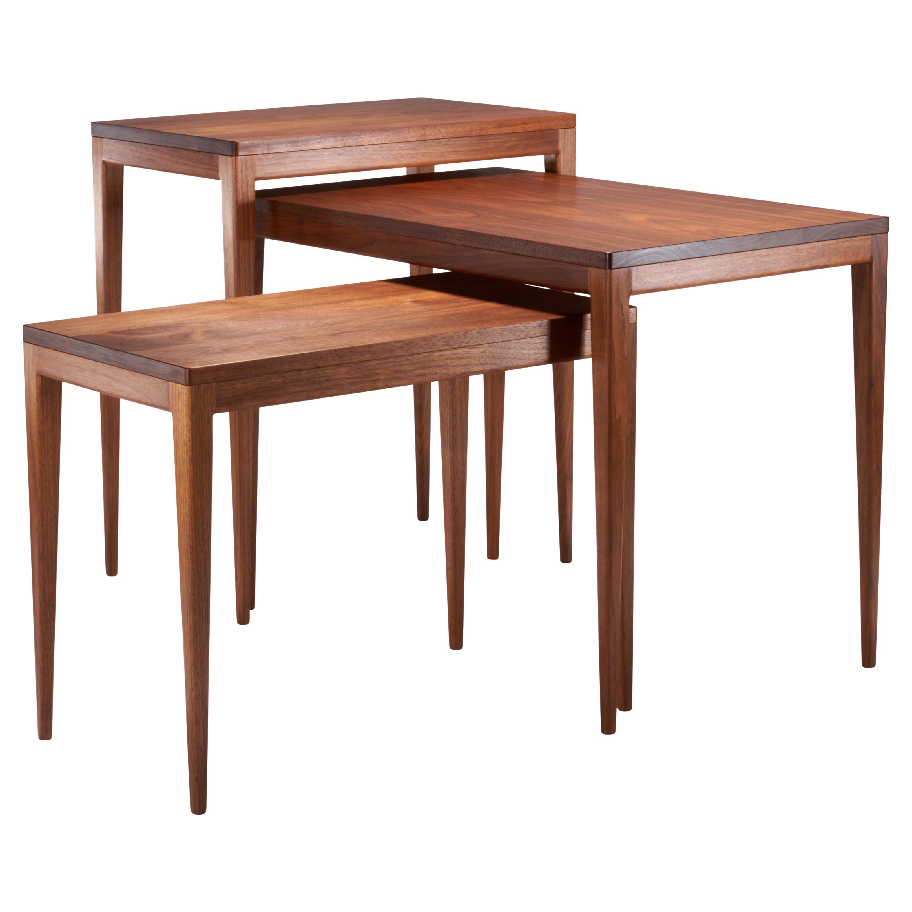 Set of three coffee tables made in American walnut For Sale