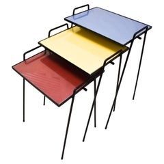 Set of Three Colorful Mid-Century Stacking Tables with Glass Tops and Iron Legs