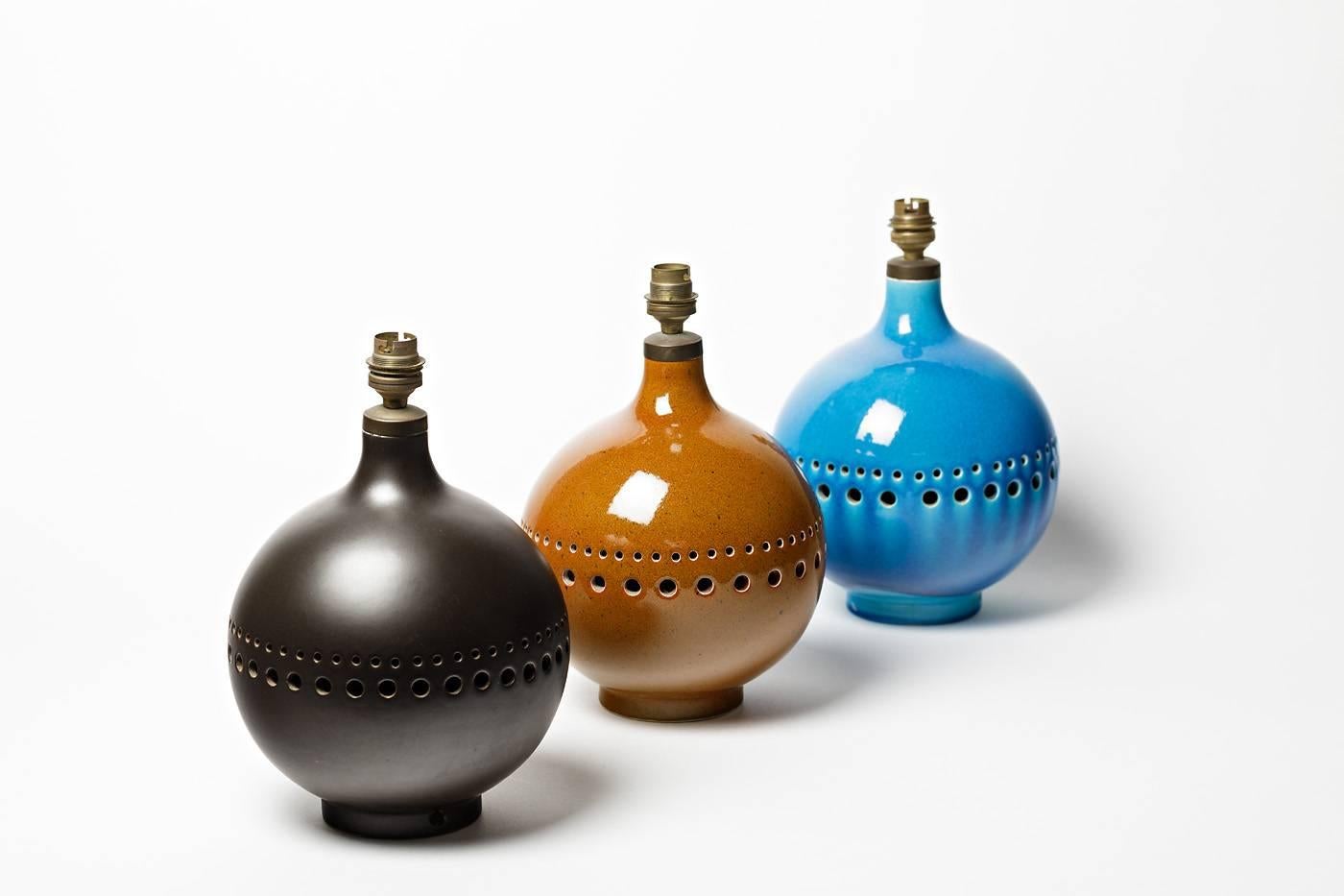 Beautiful set of three ceramic table lamp

Realised by 