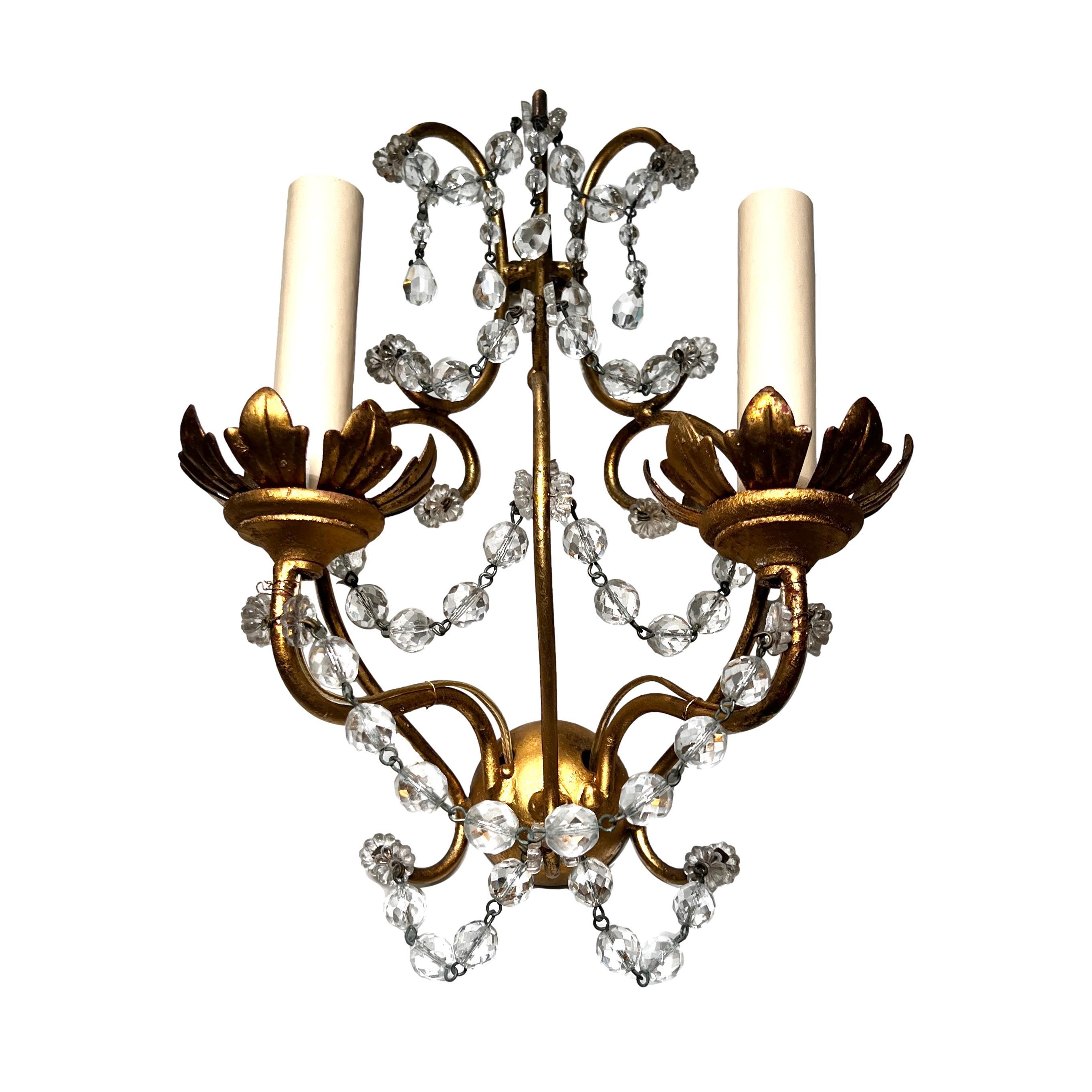 A set of 3 circa 1920s Italian gilt metal sconces with crystals. Sold individually.

Measurements:
Height: 13