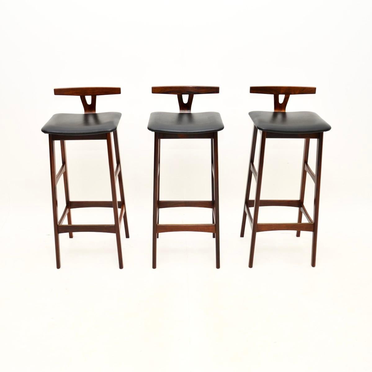A stylish and extremely well made set of three Danish Vintage bar stools by Dyrlund. They were made in Denmark, and date from around the 1960’s.

The quality is outstanding, the frames are beautifully sculpted, they have gorgeous grain patterns and