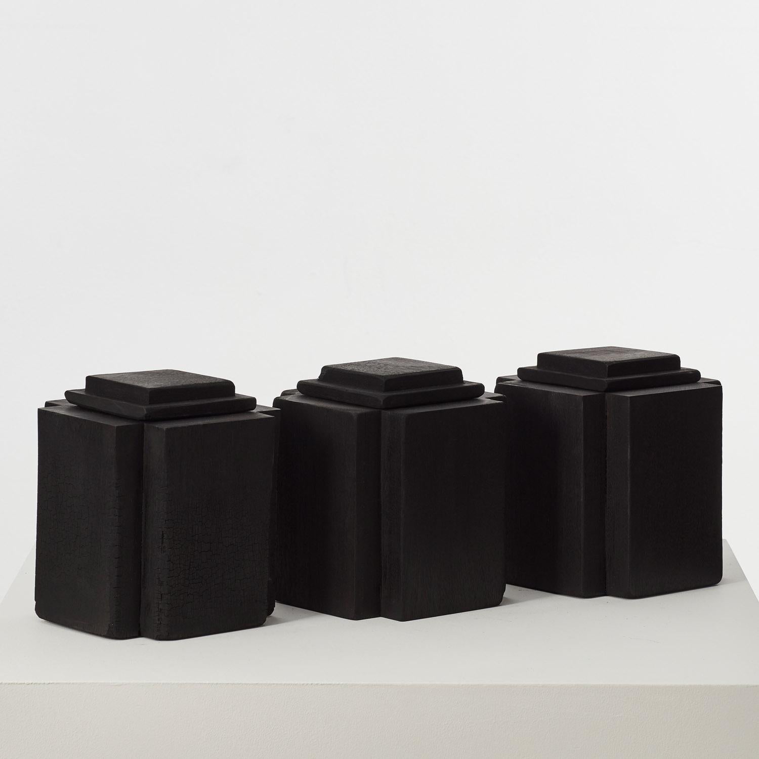 This collection of charred wood vessels has been coaxed from an assortment of offcuts found in David Horan’s workshop. The dimensions of each piece of sapele, cherry and London plane are subject to a formula devised by the designer, which defines