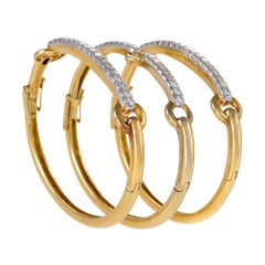 Set of Three David Webb Gold, Platinum and Diamond Bangles