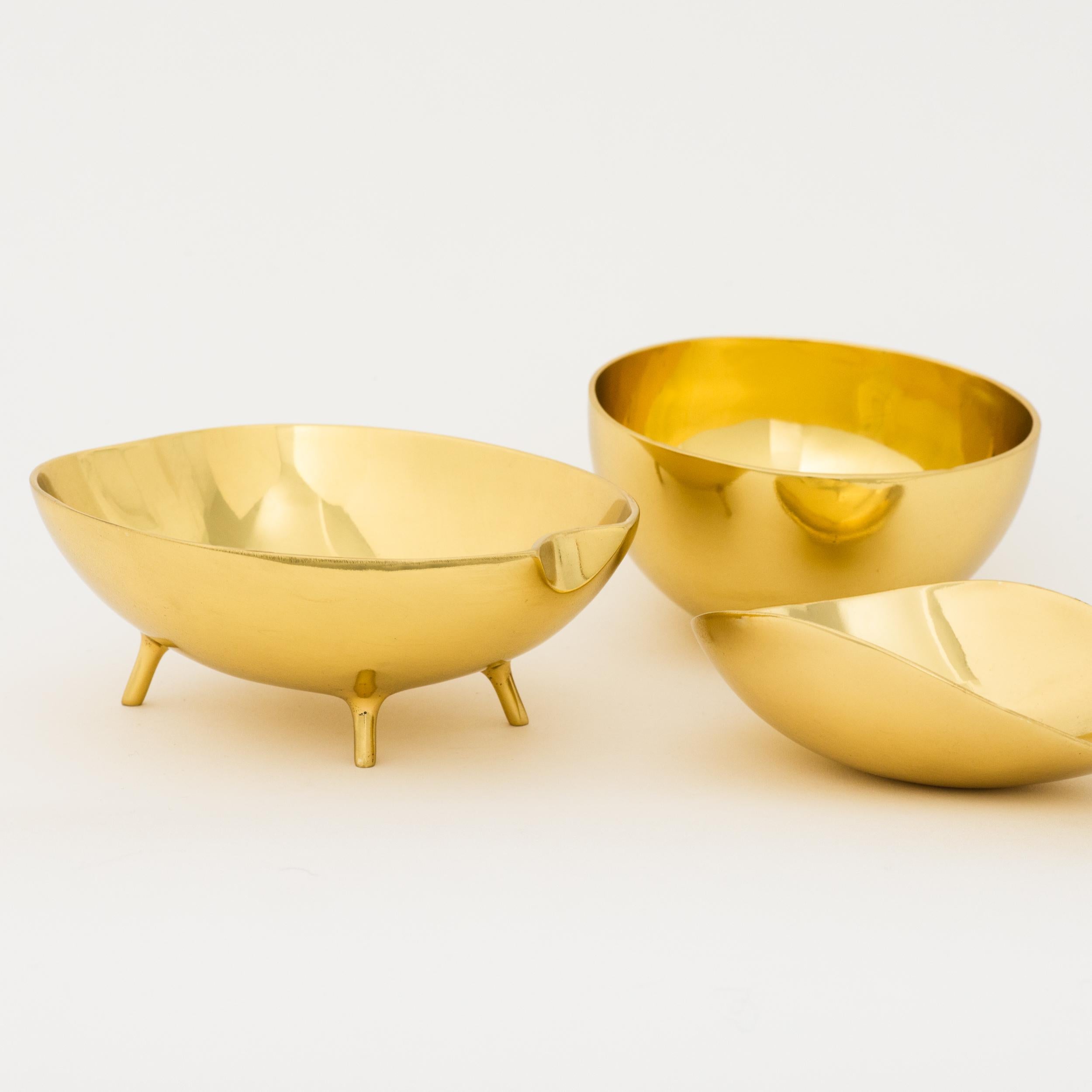 Set of three mixed handmade polished cast brass decorative bowls.

Each of those original and elegant bowls are handmade individually. Cast using very traditional techniques.

Slight variations in polished finishes, patterns and sizes are