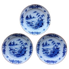 Set of three Dutch Delft Plates with garden scene and ducks, 18th Century