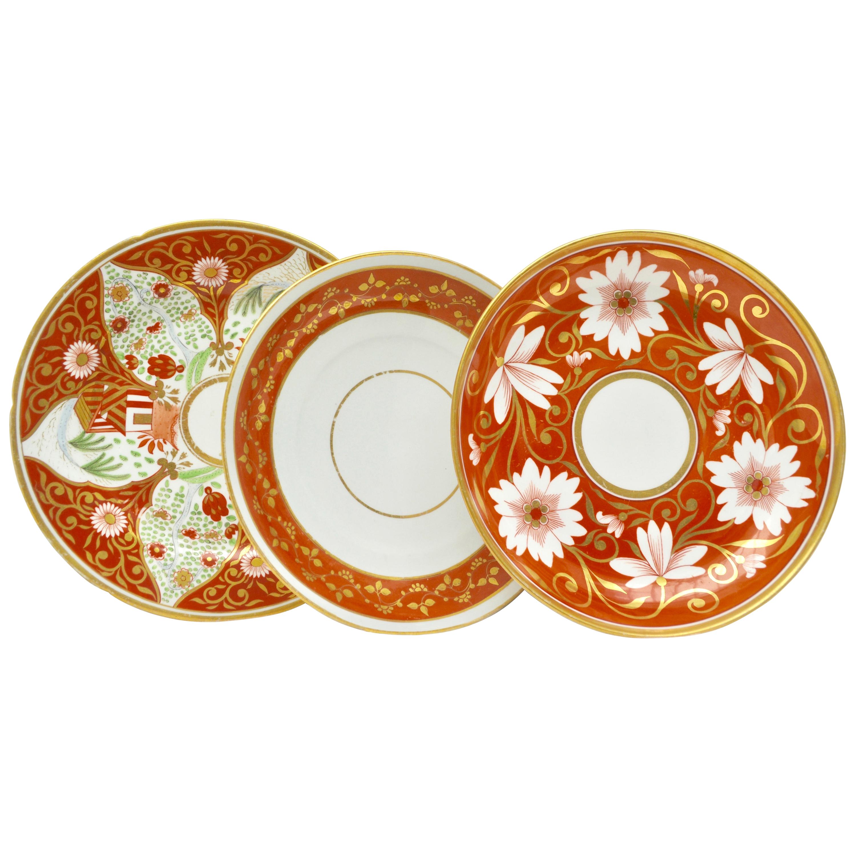 Set of Three Early 19th Century English Coral and Gold Porcelain Plates
