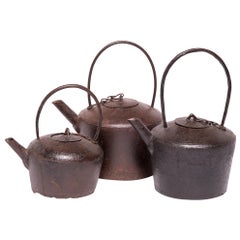 Set of Three Early 20th Century Chinese Cast Iron Tea Pots