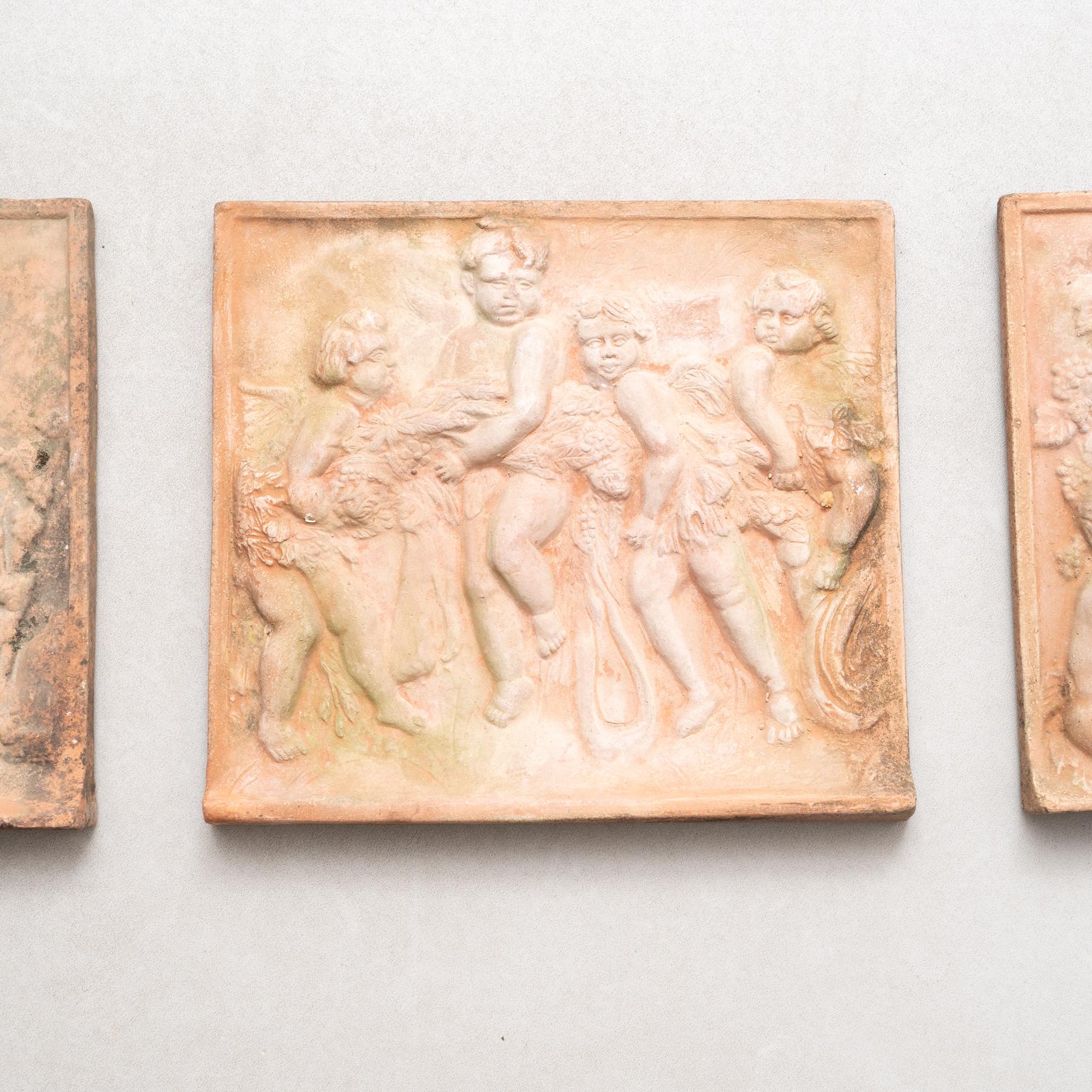 Spanish Set of Three Early 20th Century Terracotta Wall Sculptures For Sale