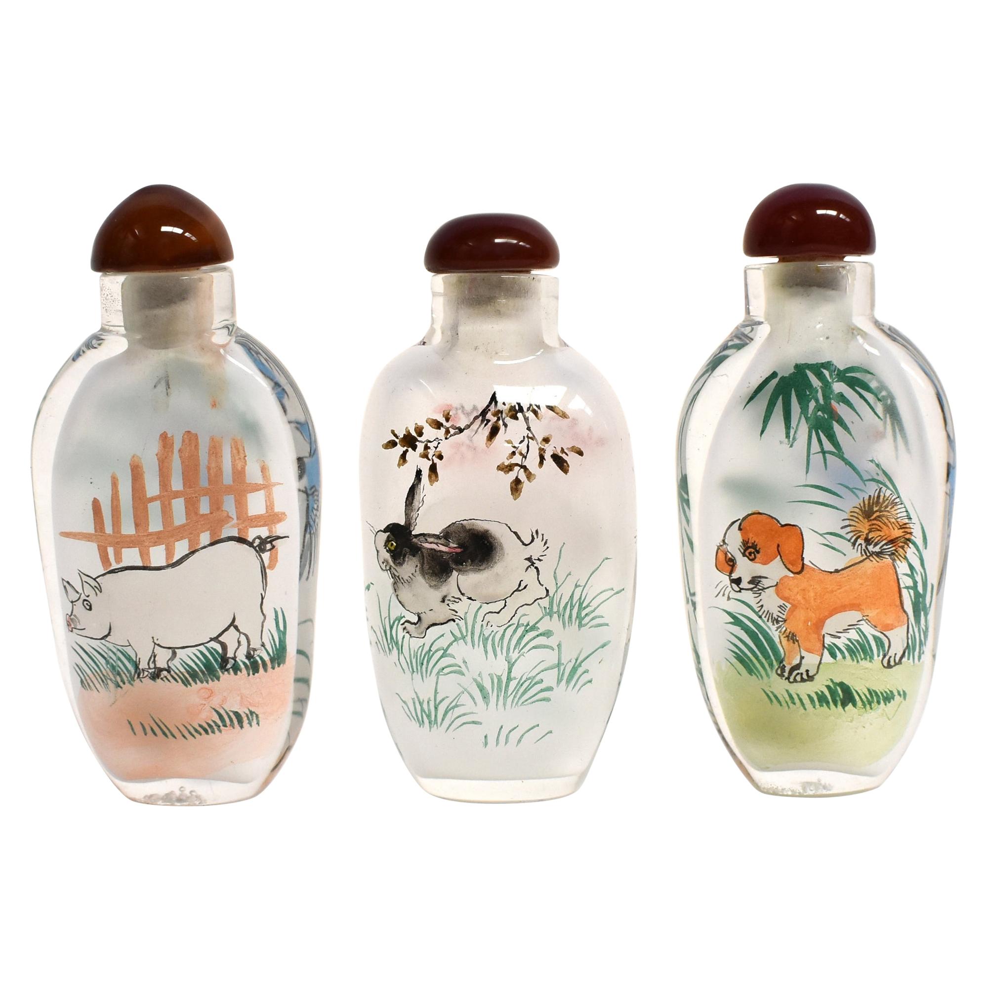 Set of Three Eglomise Reverse Painted Snuff Bottles with Zodiac Animals
