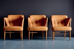 Set of three elegant Lounge Chairs upholstered in cognac Leather, Germany 1950s