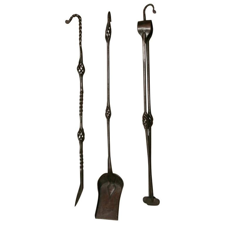 Set of Three English Arts & Crafts Hooked Iron Firetools