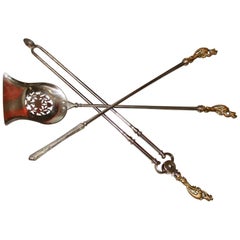Set of Three English Bronze and Polished Steel Fire Tools with Dragon Handles