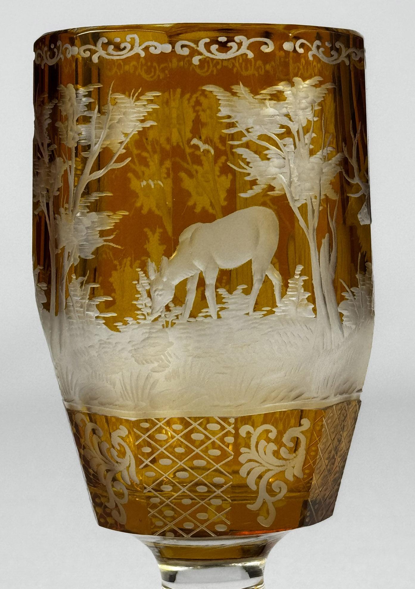 Glass Set of three engraved goblets, cut with amber glaze, 20th century For Sale