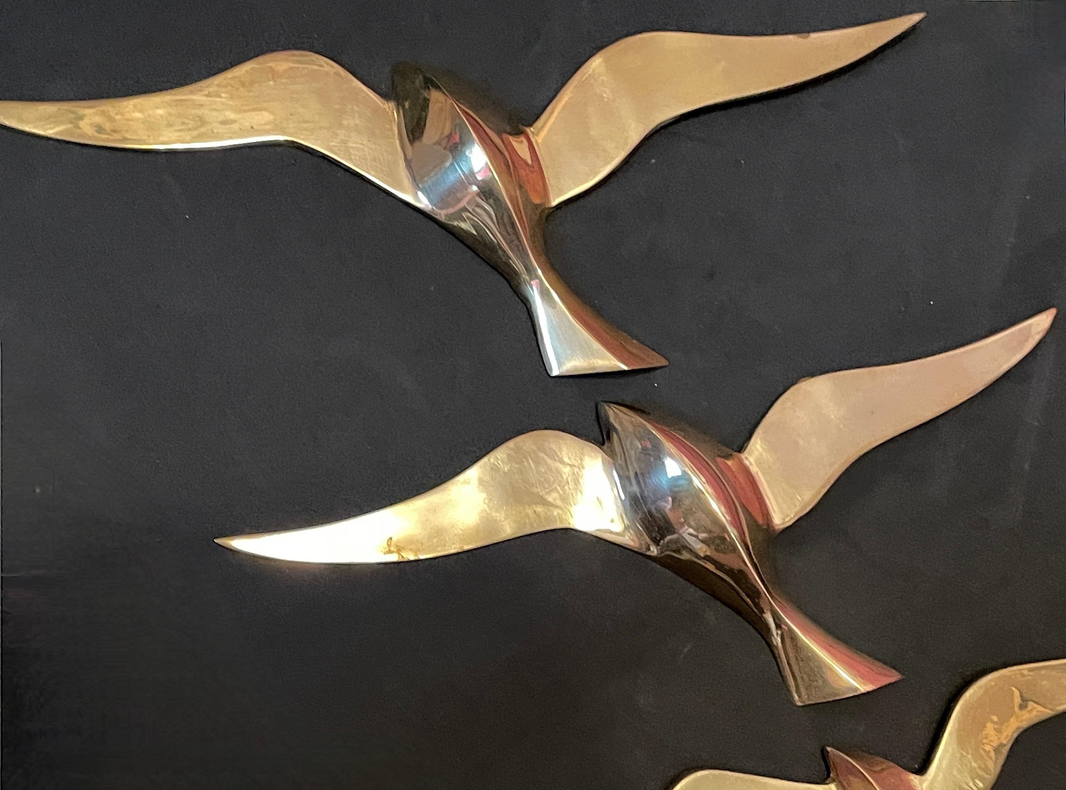 brass swallow wall hanging