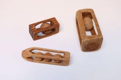 Set of Three Folk Art Petite Handcarved Whimsy Ball in Cage Sculptures