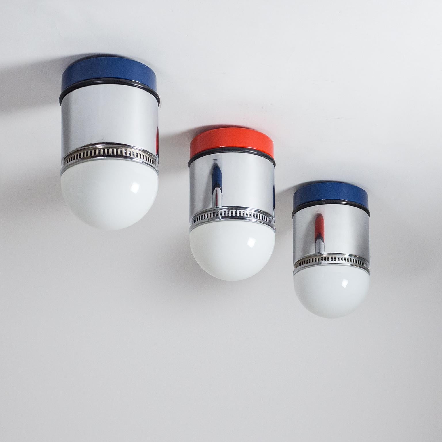 Set of three Postmodern ceiling lights designed by Gianni Celada for Fontana Arte, 1980. These model 'Sisten' flush mounts are made of chromed and lacquered steel with opaline glass diffusers. Very good original condition with minimal wear. One