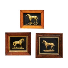 Set of Three Framed Gilt Bronze Horses Mounted on Black Velvet, circa 1850