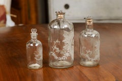 Set of Three French 19th Century Glass Vanity Bottles with Etched Floral Décor