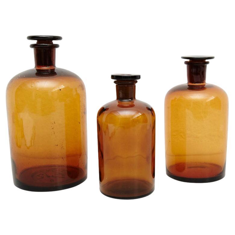 Set of Three French Vintage Amber Glass Pharmacy Bottle, circa 1930