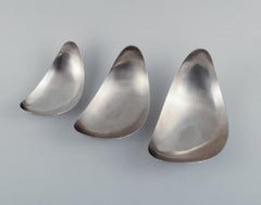 Set of three Georg Jensen "Leaf" bowls in stainless steel. Late 1900s.