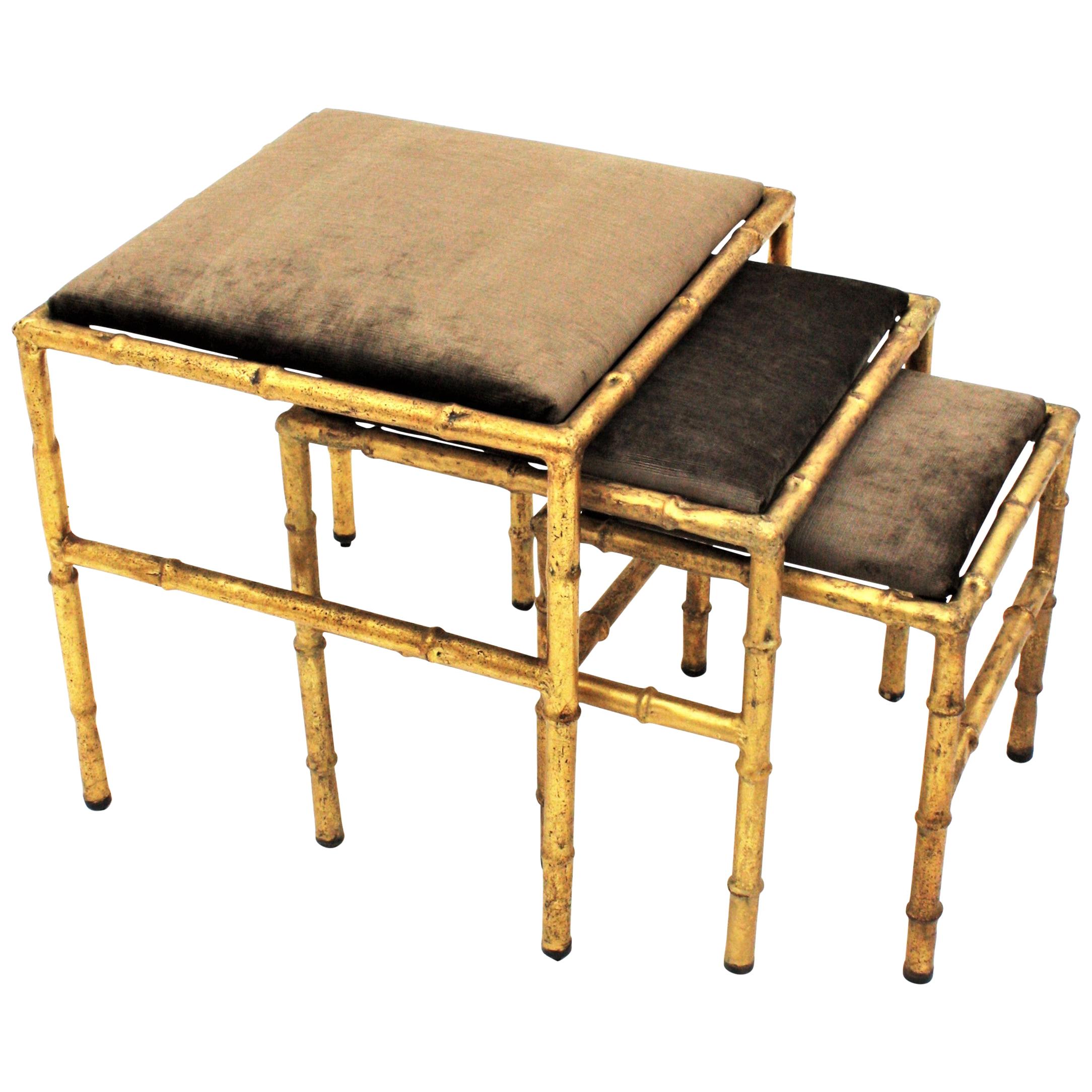 Set of Three Gilt Iron Faux Bamboo Nesting Stools Upholstered in Taupe Velvet