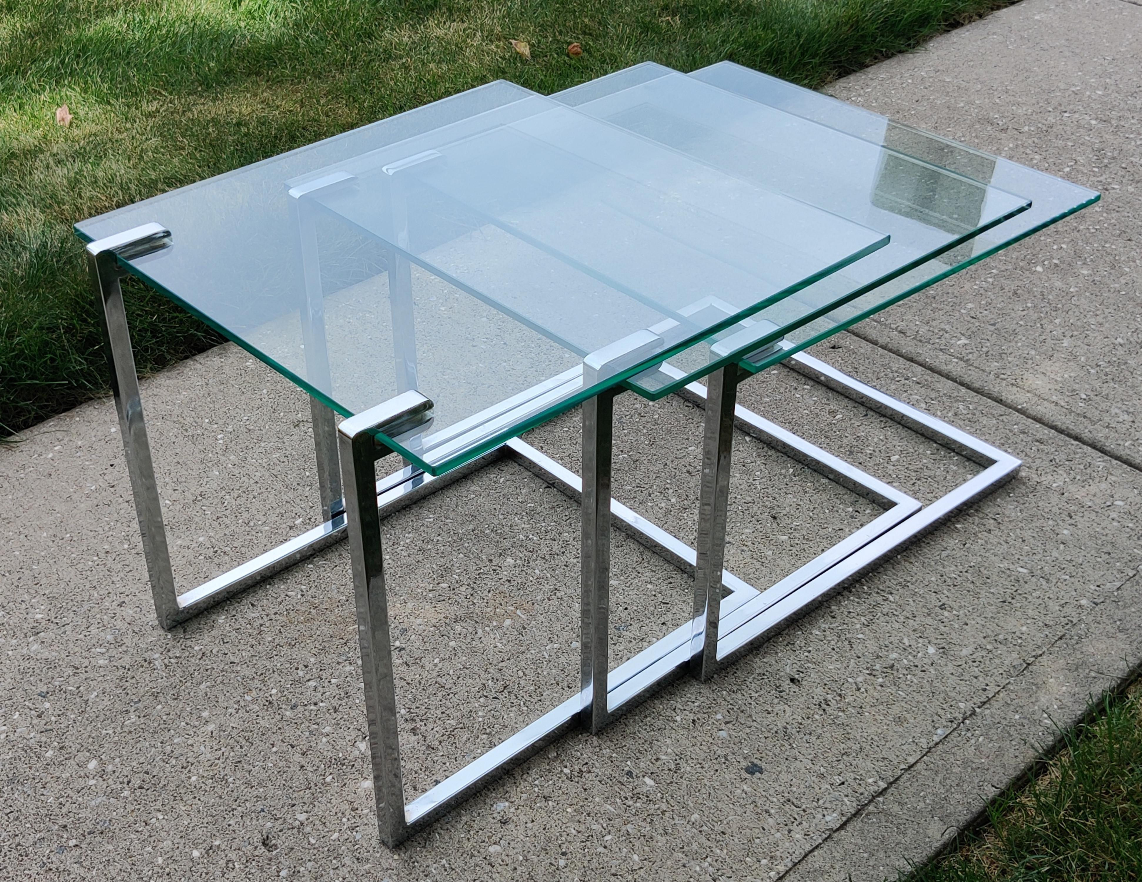 Set of Three Glass & Chromed Steel Nesting Tables By Design Institute America In Good Condition For Sale In Philadelphia, PA