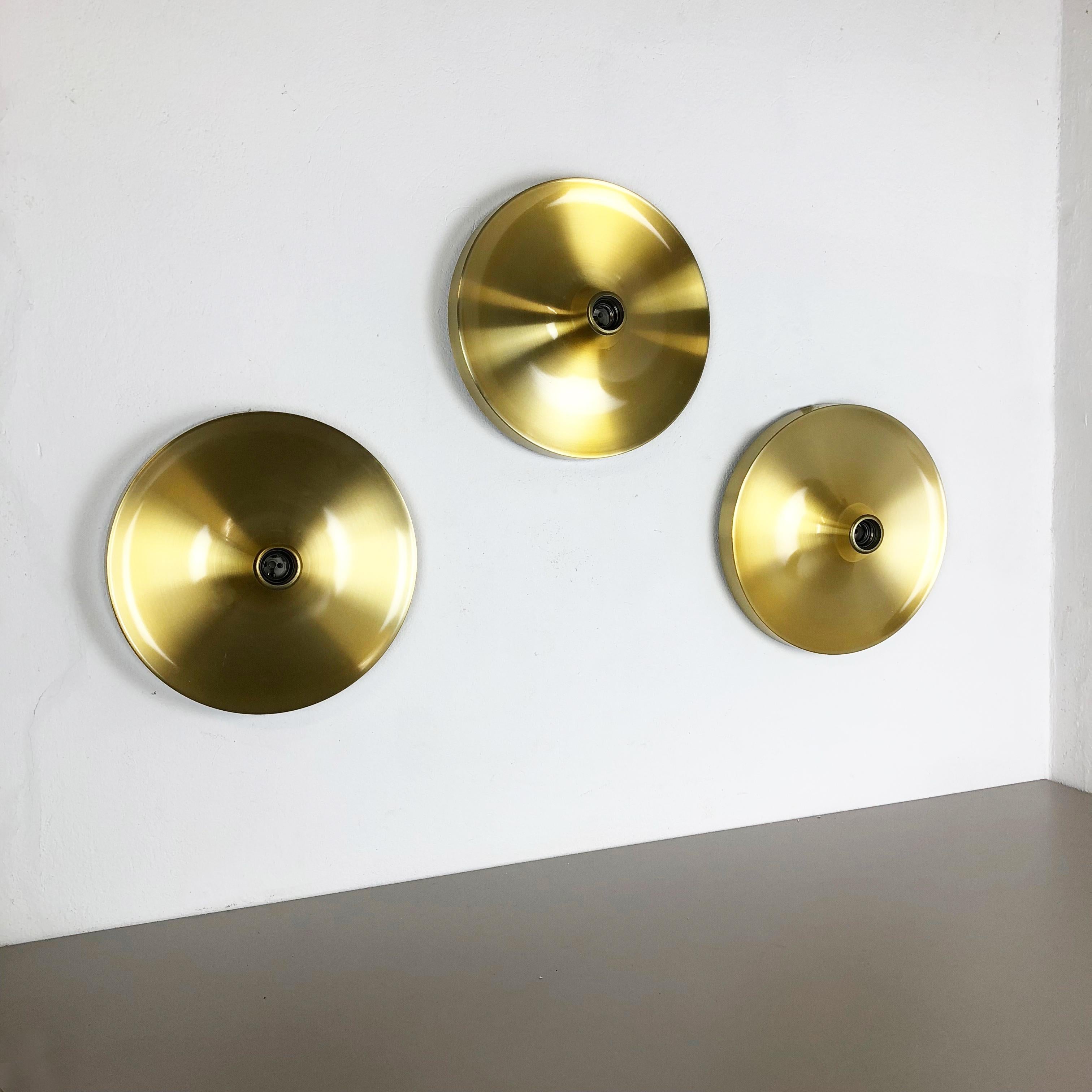 Mid-Century Modern Set of Three Gold 1960s Charlotte Perriand Disc Wall Light by Honsel, Germany For Sale