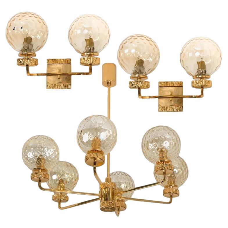 Ensemble de trois luminaires en verre plaqué or dans le style de Brotto, Italie