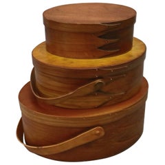 Set of Three Graduated Oval Lesher School Handled Shaker Boxes, 20th Century