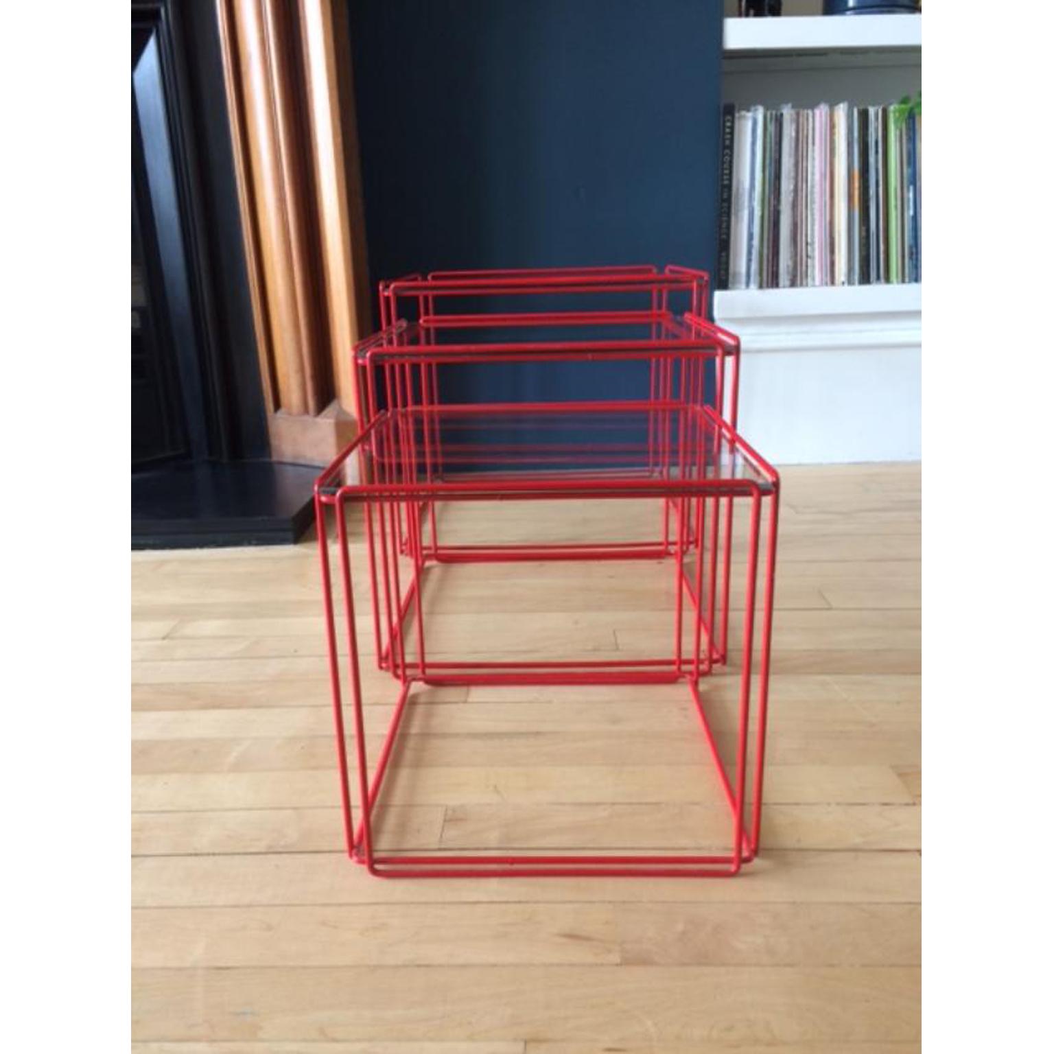 Vintage modernist midcentury set of three Graphical 'Isocele' glass nesting side tables. These are timeless Minimalist furniture pieces designed by Max Sauze for Atrow in 1970. 

Max Sauze was a French sculptor and artist. Measurements: H 40/36/30
