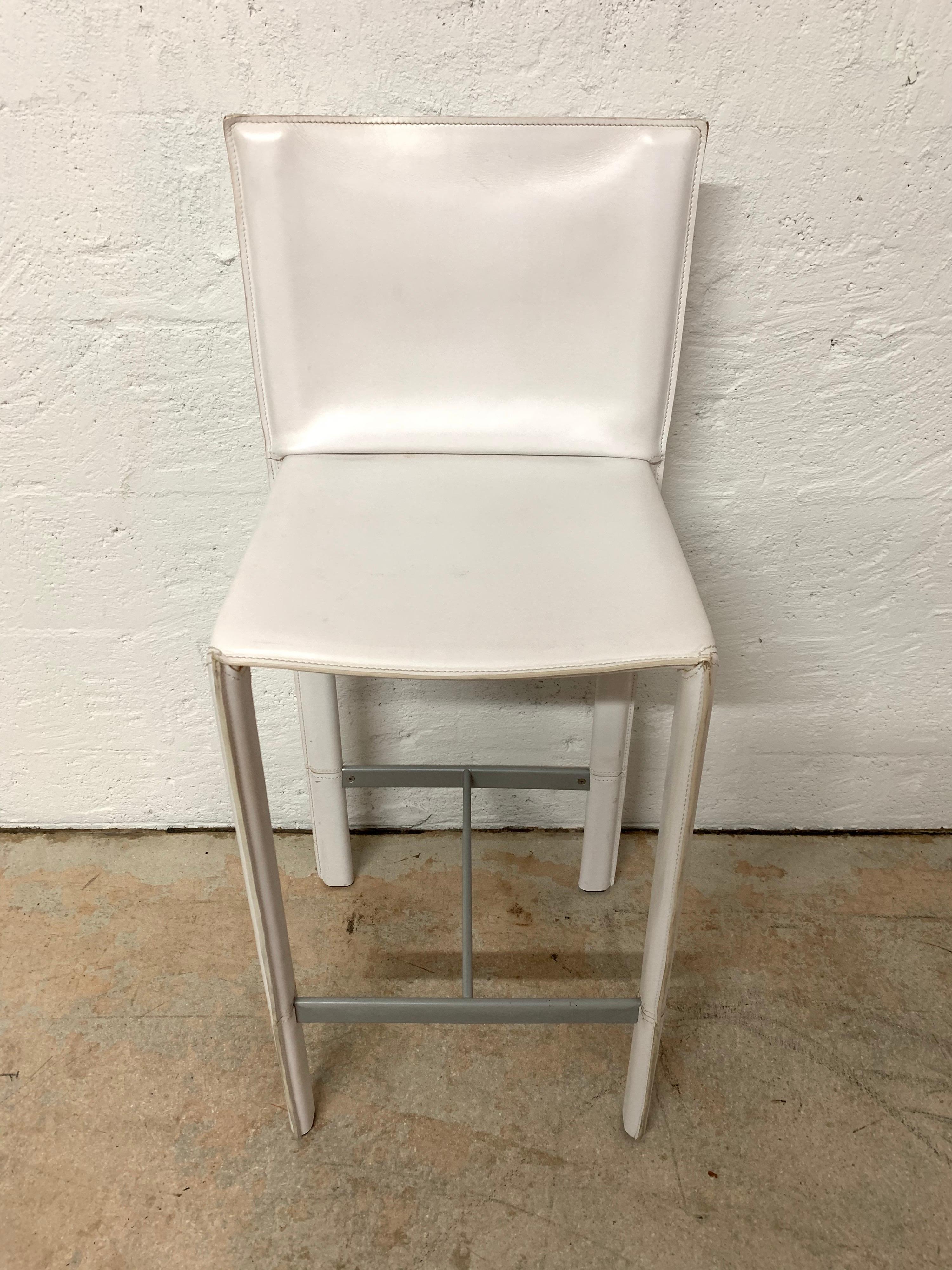 Postmodern trio of bar stools rendered in handstitched white saddle leather with footrest designed by Grazzi and Bianchi for Enrico Pellizzoni, Italy, 1980s.