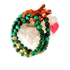Set of three green tigers eye gemstone bracelets