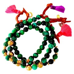 Set of three green tigers eye gemstone bracelets Set of three green tigers eye gemstone bracelets