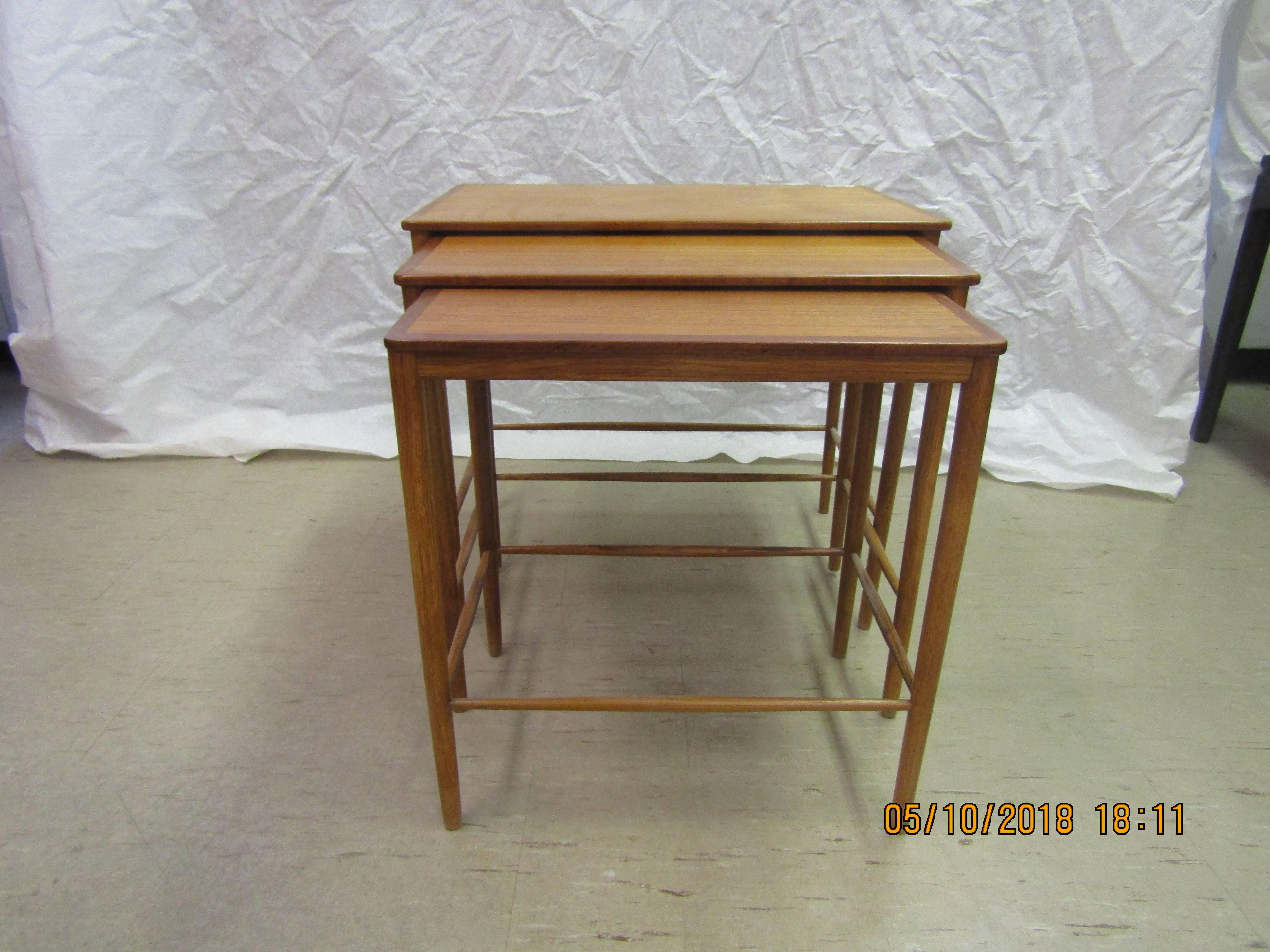 A set of three Greta Jalk teak nesting tables manufactured by Jeppesens Mobelfabrik A/S Denmark.