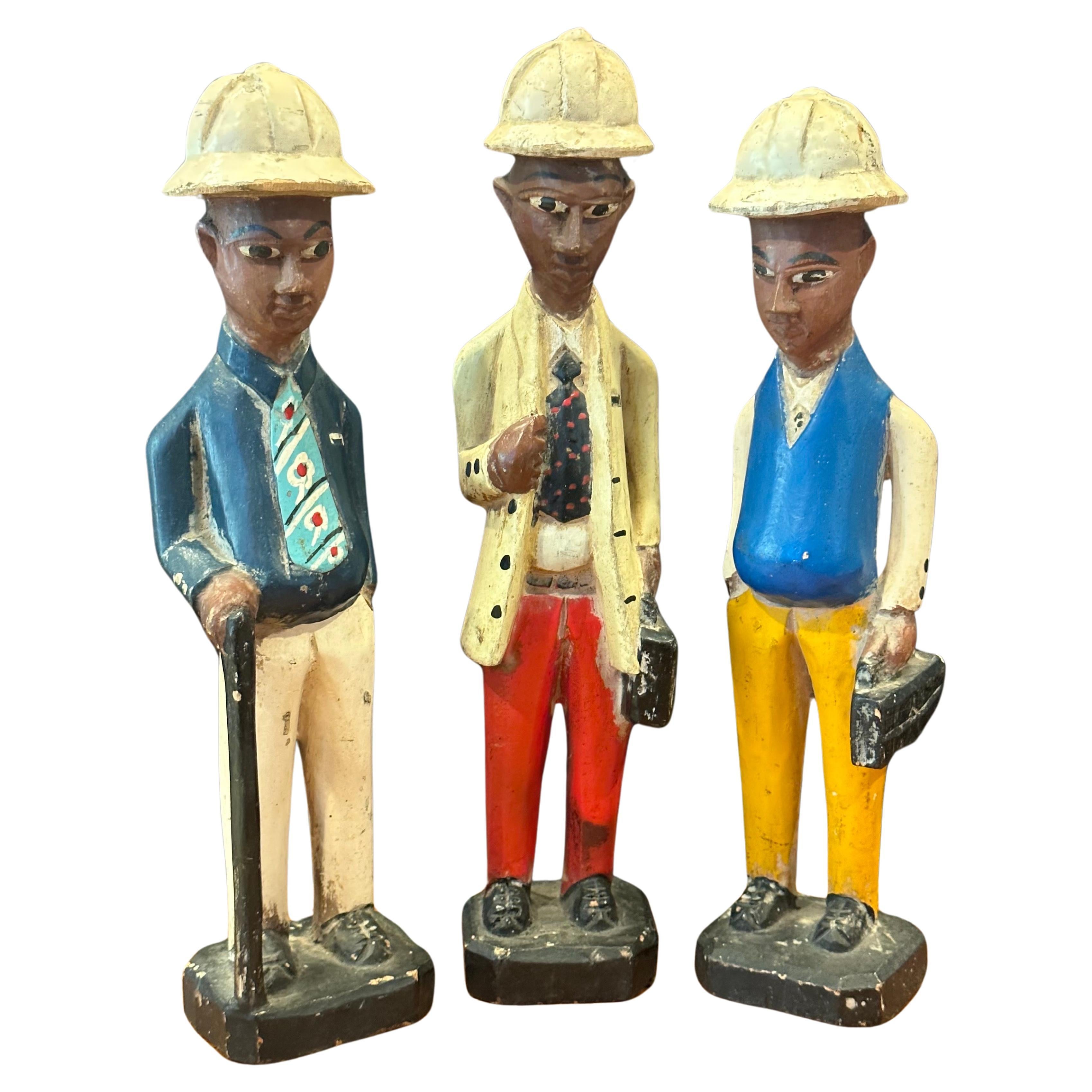 Set of Three Hand Carved Figural African Polychromed Colonial Style Sculptures For Sale