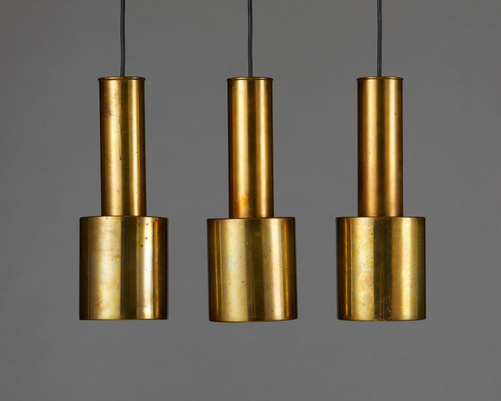 Mid-Century Modern Set of Three “Handgrenade” Pendant Lights Designed by Alvar Aalto
