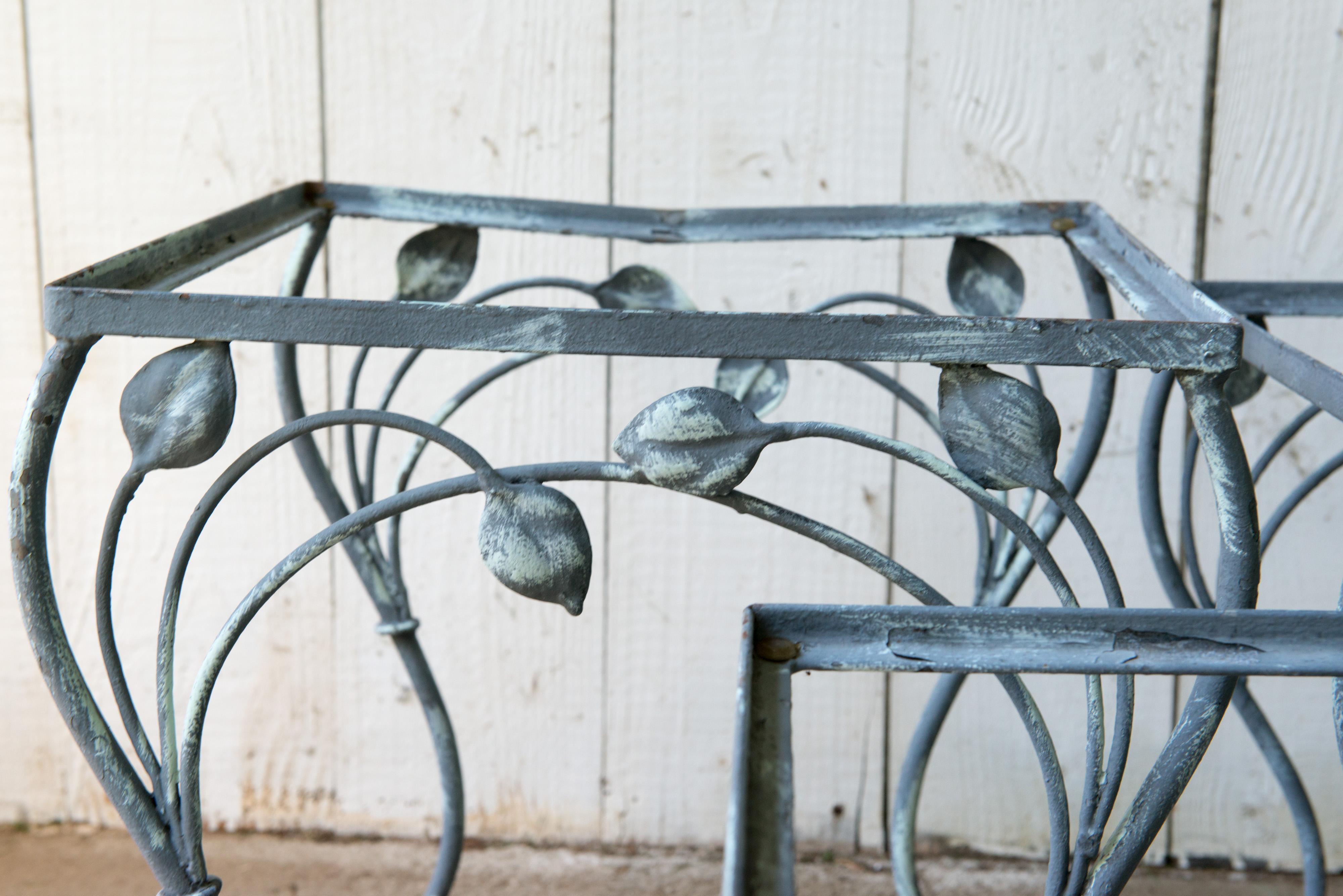 Set of 3 handcrafted wrought iron nesting tables by Salterini. Beautiful, elegant yet strong sturdy pieces. Glass table tops will be included. We have several other pieces of matching Salterini seating pieces.
