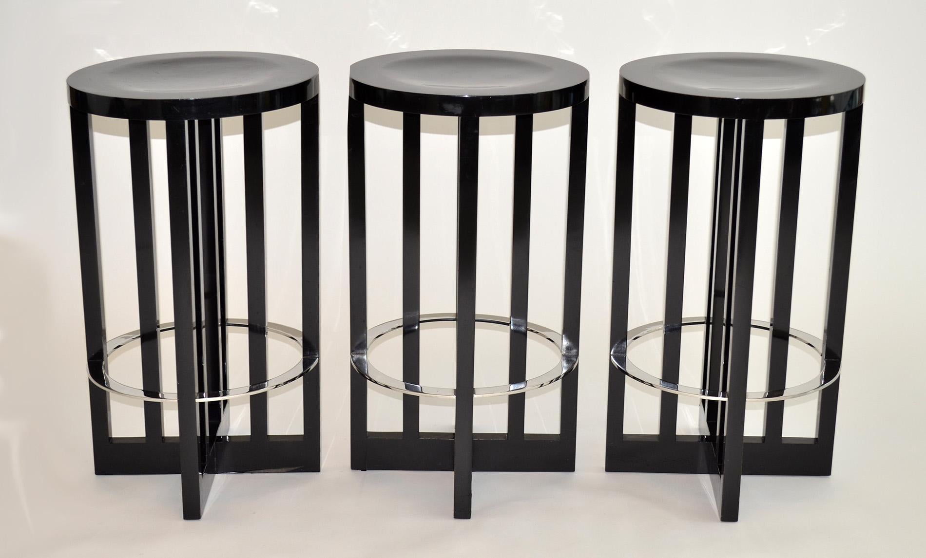 Set of three high bar stools by Richard Meier for Knoll 1982 in laminated hard maple veneer and stainless steel produced for Knoll International. All signed.
        