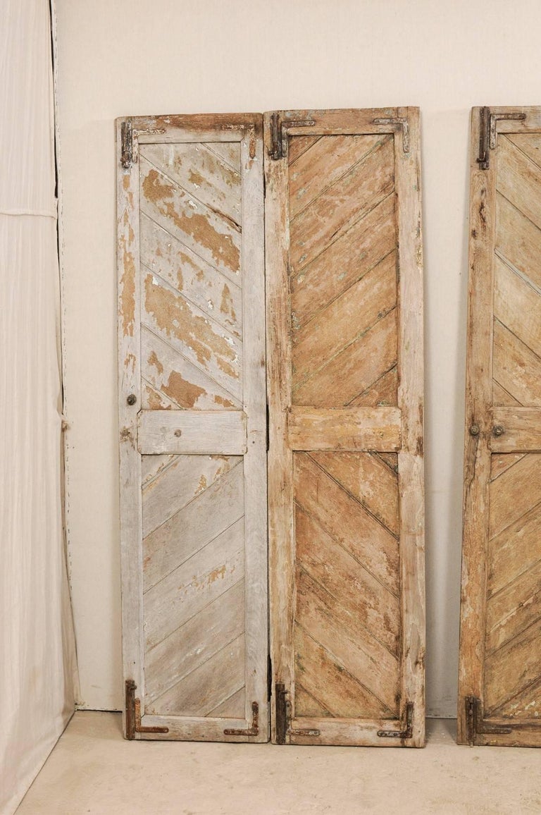 Set of Three HingedPairs of Carved Wood European Rustic Doors For Sale at 1stdibs