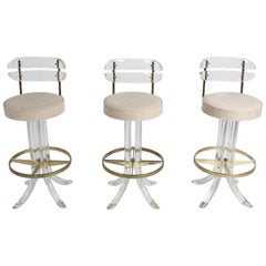 Set of Three Hollywood Regency Lucite with Brass Swivel Bar Stools by Hill MFG