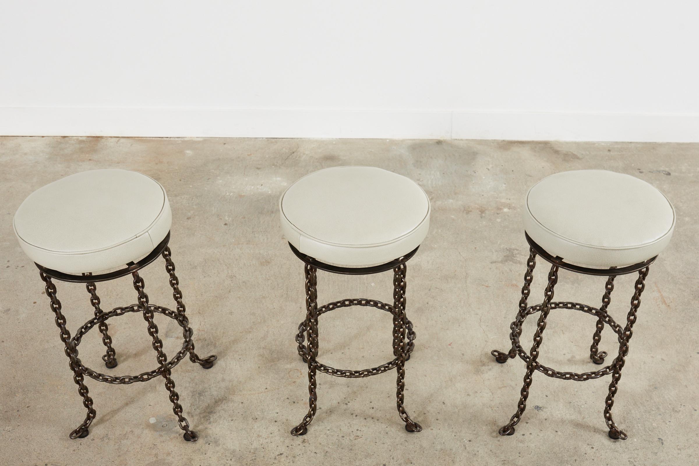 American Set of Three Industrial Style Chain Link Swivel Barstools For Sale