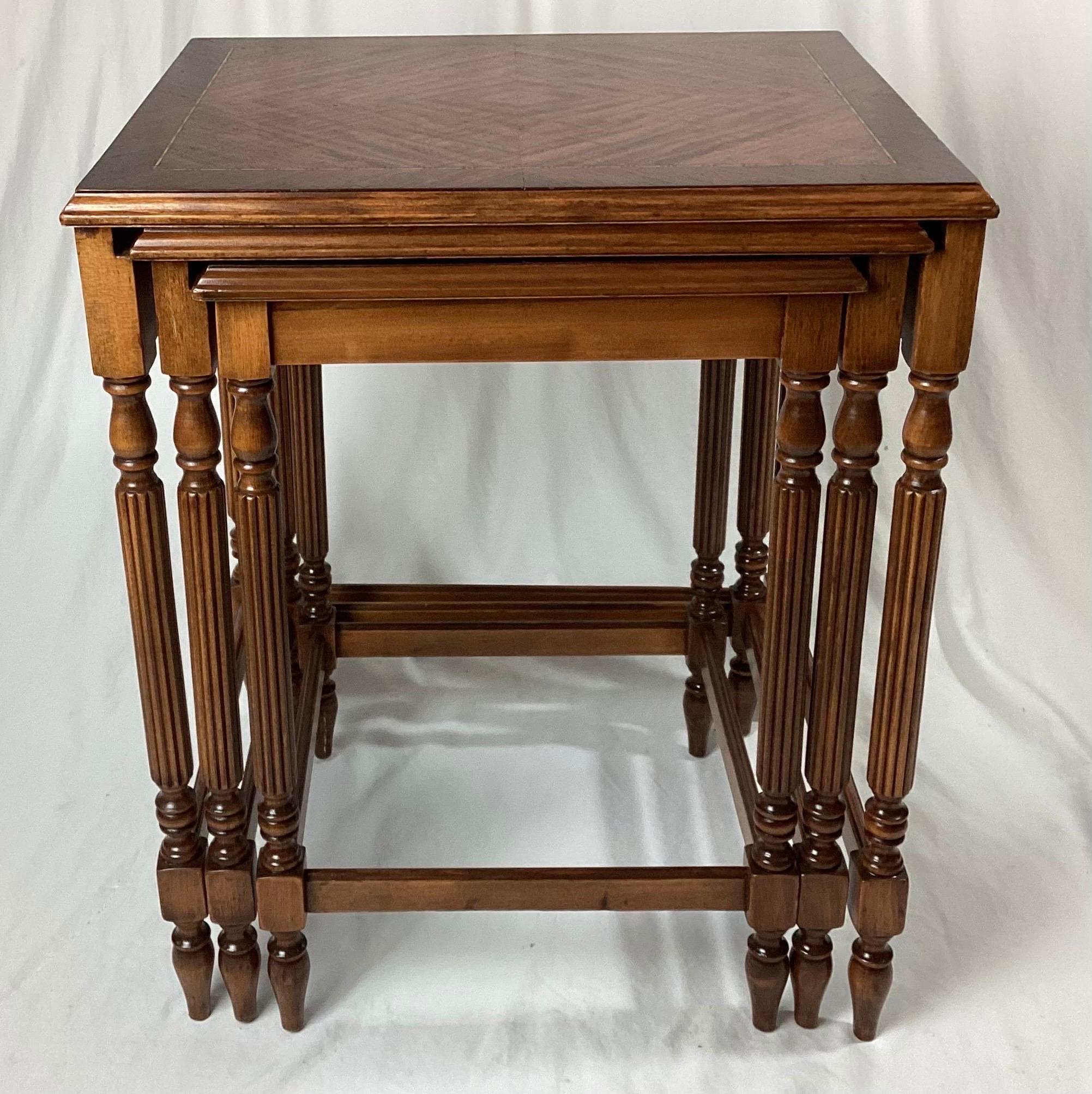 Set of three inlaid nesting end side tables. The largest is 18 1/2