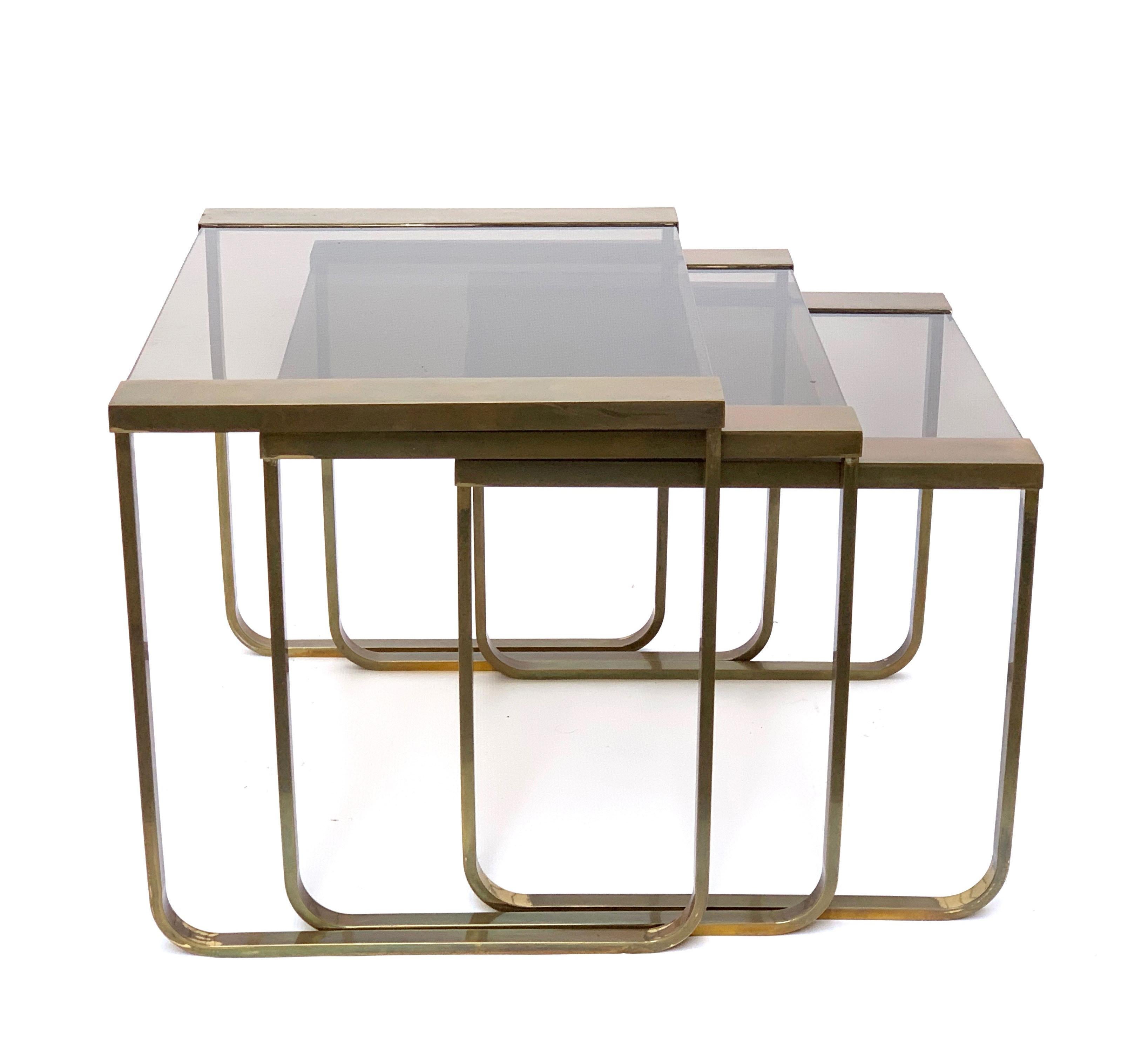 Set of Three Interlocking Tables in Satin Brass and Smoked Glass, France, 1970s 8