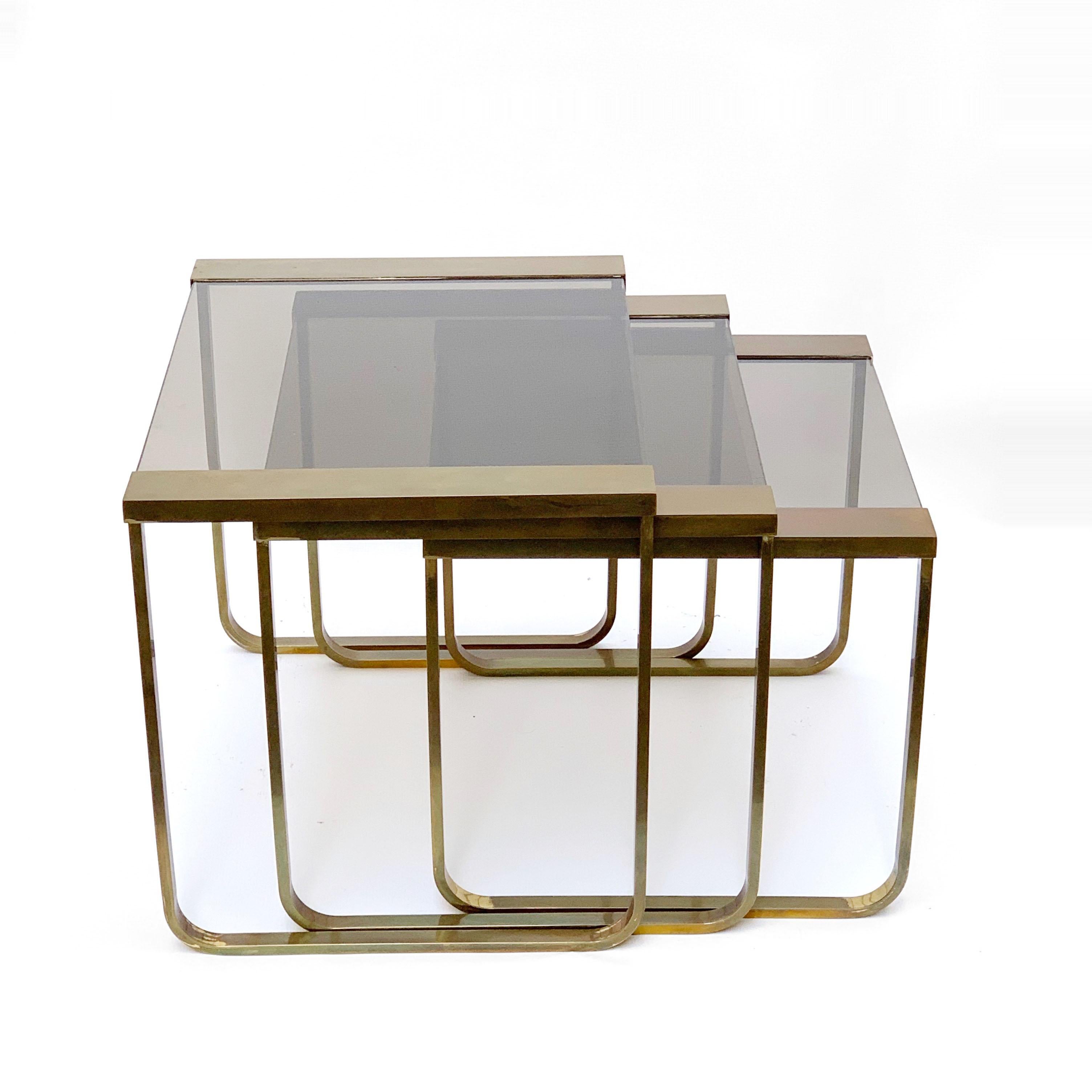 Burnished Set of Three Interlocking Tables in Satin Brass and Smoked Glass, France, 1970s