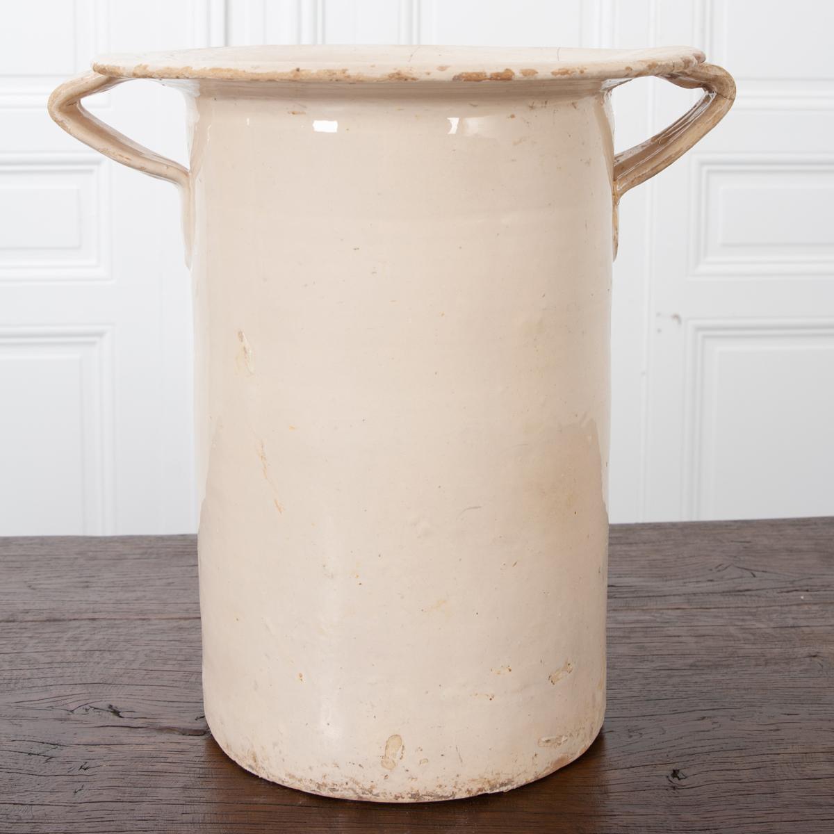 Here are three, extremely versatile large antique Italian pots. Handmade from Italy, these glazed pots are sometimes called Top Hats and would be perfect indoors or outdoors. They are a beautiful creamy-beige glazed ceramic, rustic vase with two